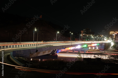 View of Pune in summer, Cityscape Skyline, buildings holdings, Signboards, and banners, Pune, Maharashtra, India © Sandeep