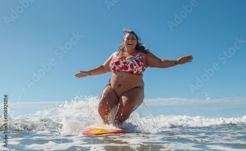  A plus-size woman rides a surfboard on a stunning beach during a sunny day.Generated image