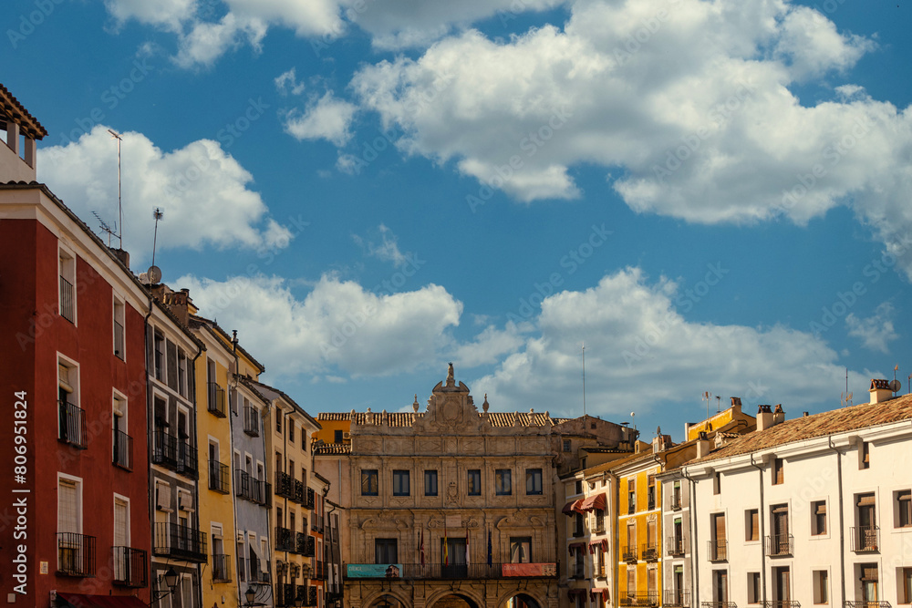The central square of Cuenca, Spain, with its colorful buildings and medieval style The central square of Cuenca, Spain, with its colorful buildings and medieval style