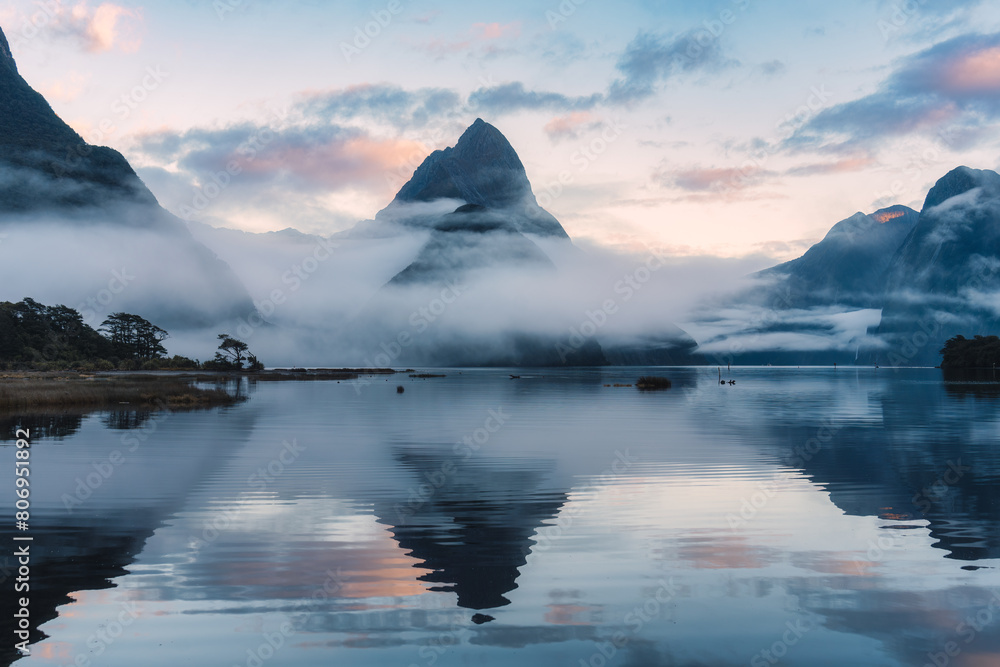 Fototapeta premium Milford Sound with Mitre peak and foggy on the lake at Fjordland national park, New Zealand