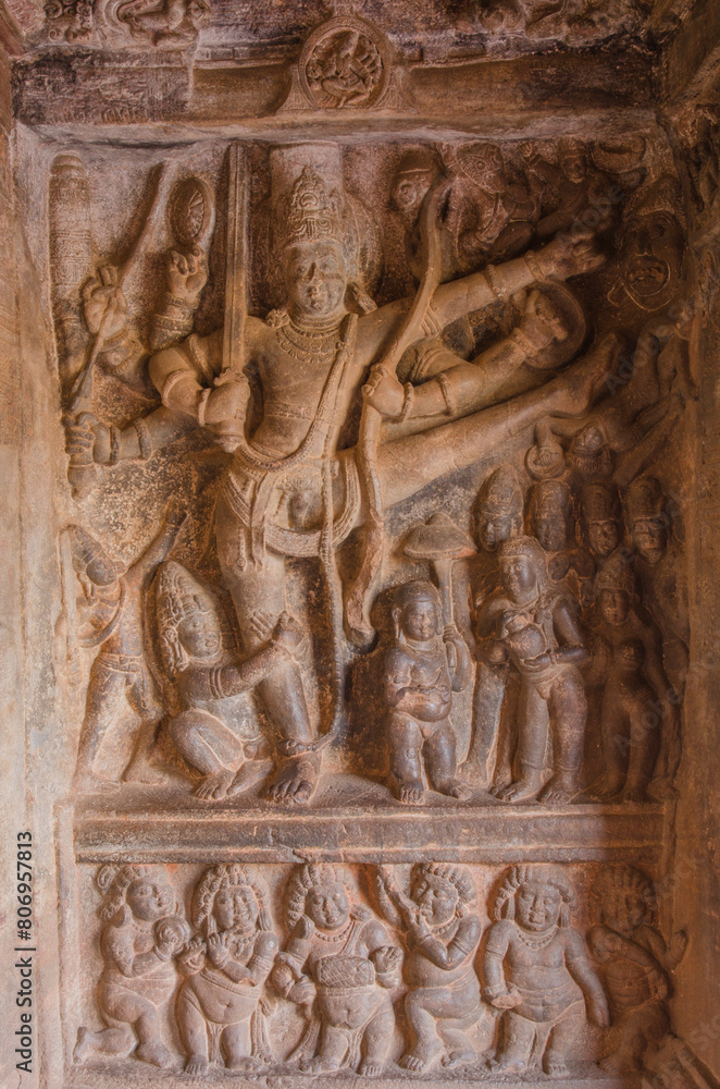 Sculpture or carving of Lord Vishnu. Vamana-Trivikrama Avatar. fifth Avatar of Vishnu at Badami Cave Temple 2, Karnataka, India. Sculpture or carving of Lord Vishnu. Vamana-Trivikrama Avatar. fifth Avatar of Vishnu at Badami Cave Temple 2, Karnataka, India.