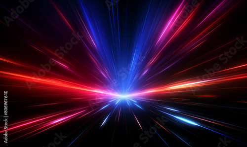 Abstract colorful light-speed effect background with red, blue, and purple rays for a futuristic technology concept.