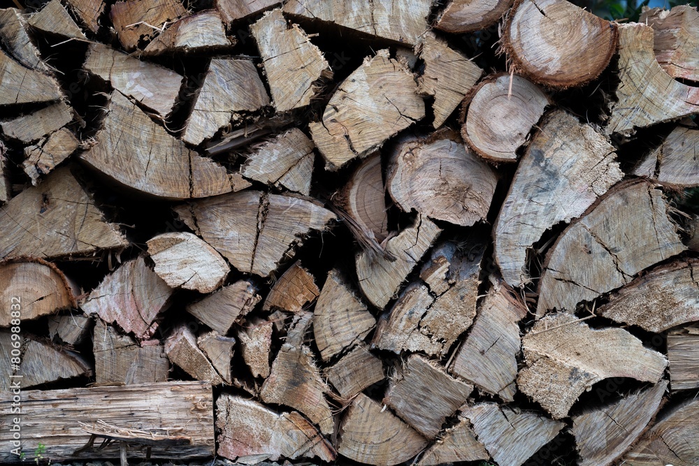 Pile of stacked fire wood in a Garden by a house in Tasmania Australia Pile of stacked fire wood in a Garden by a house in Tasmania Australia