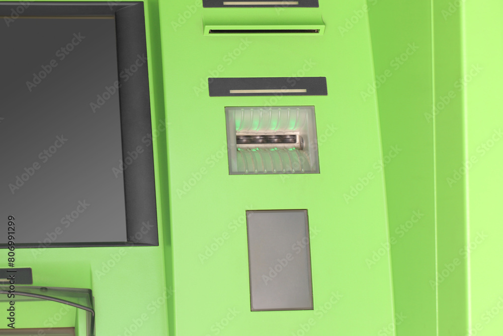 Modern automated cash machine with screen outdoors Modern automated cash machine with screen outdoors