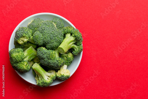 broccoli of fresh green broccoli in bowl over coloredbackground. , close up. Fresh vegetable photo