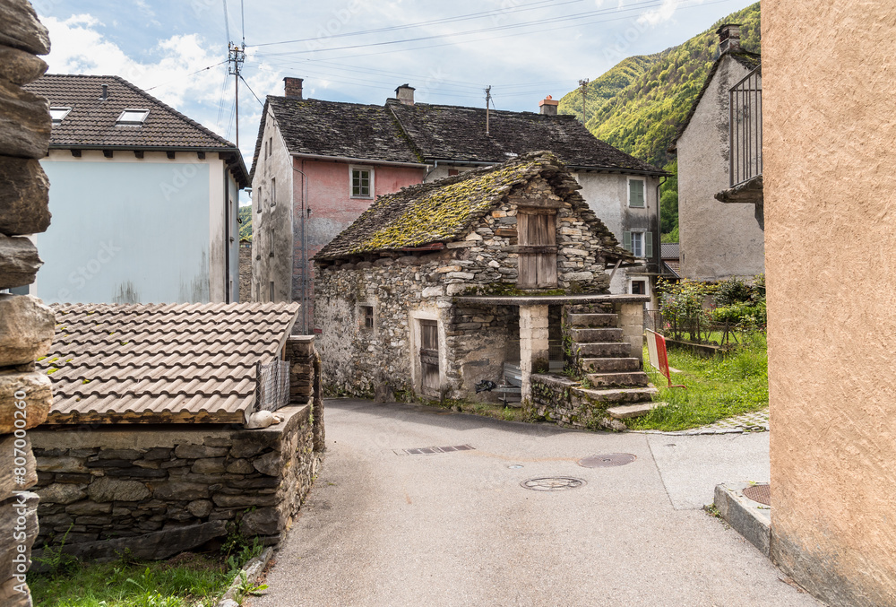 Ancient village Moghegno with rustic stone houses, hamlet of Maggia in the Canton of Ticino, Switzerland Ancient village Moghegno with rustic stone houses, hamlet of Maggia in the Canton of Ticino, Switzerland