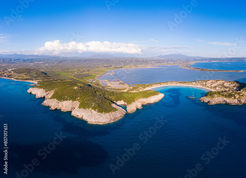Aerial beautiful beach and water bay in the greek spectacular coast at half moon Voidokilia famous beach of Peloponnese. Turquoise blue transparent water, Greece summer top travel destination