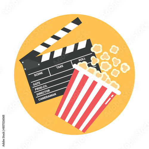 Cinema emblem with an open clapper board and popcorn bucket. Round yellow background. Vector illustration in flat style photo