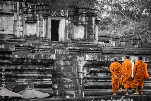 Monks in Baphuon, Angkor Thom, Cambodia photo