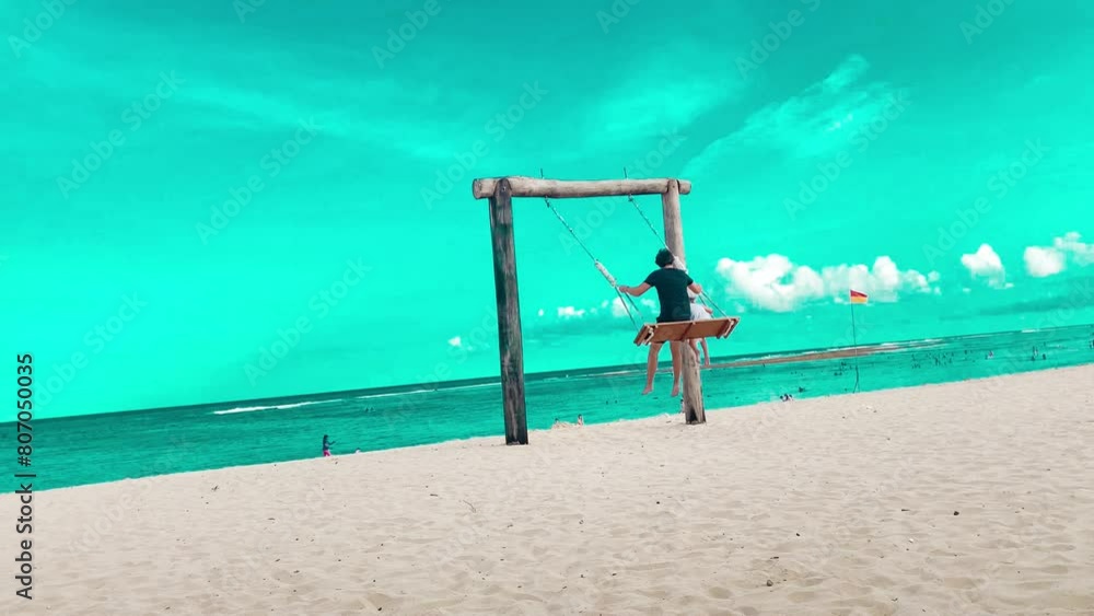 Swing and pathways at beach against blue sky Swing and pathways at beach against blue sky