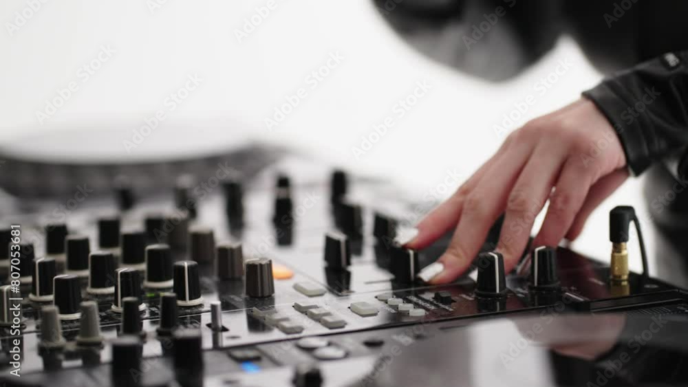 Woman DJ Mixing Tracks And Recording New Album In Modern Record Studio, Closeup of Hands Woman DJ Mixing Tracks And Recording New Album In Modern Record Studio, Closeup of Hands