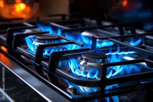kitchen gas stove burner displaying a bright blue flame, highlighting the clean and efficient energy source for cooking in a modern home kitchen