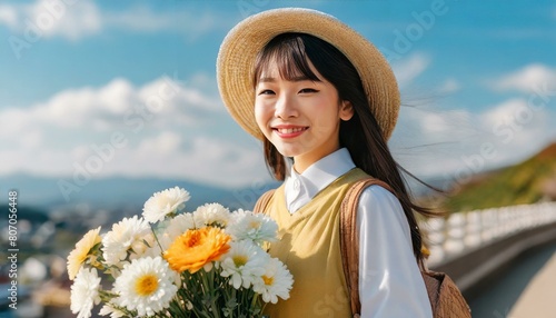  晴れた青空の日に、目元の明るい、かわいい女の子がたくさんの花を持って笑顔で歩いている、写真