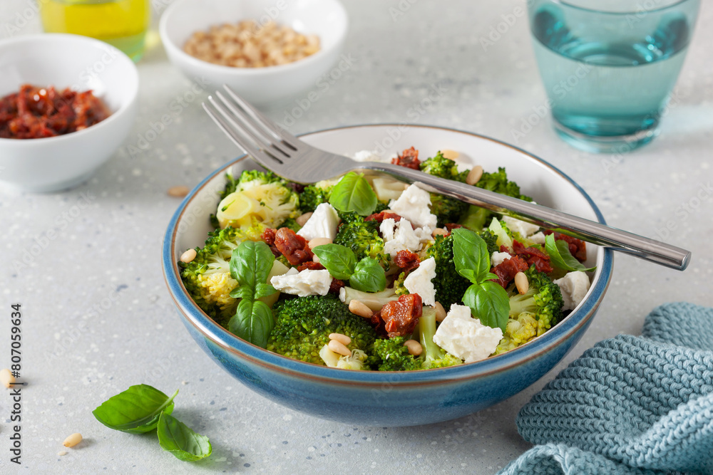 healthy broccoli salad with feta cheese sun dried tomatoes pine nuts.. vegetarian low carb keto diet healthy broccoli salad with feta cheese sun dried tomatoes pine nuts.. vegetarian low carb keto diet
