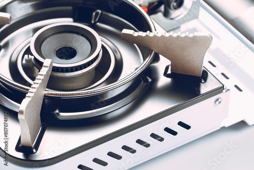 Gas stove with metal comfort. Camp and kitchen stove. Repair and maintenance of gas equipment.