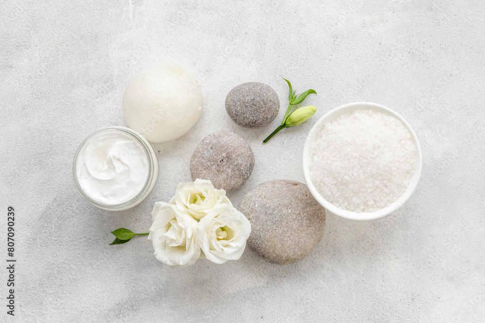 Spa set with white roses and blank bottles of skin care cosmetics Spa set with white roses and blank bottles of skin care cosmetics
