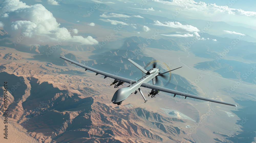 Naklejka premium A military drone flies over a desert landscape