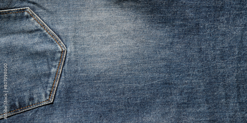 texture of blue jeans denim fabric with seam background texture of blue jeans denim fabric with seam background