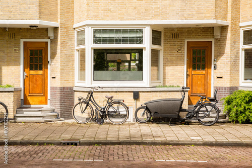 Canvas Print Two doors of two houses in Amsterdam, Netherlands