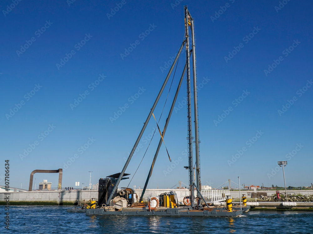 dredge of saline in salt ponds of Aveiro pictoresque village street view, The Venice Of Portugal dredge of saline in salt ponds of Aveiro pictoresque village street view, The Venice Of Portugal