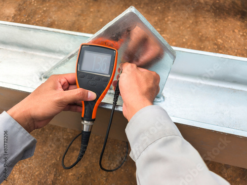 Measure the Coating Thickness Galvanized with a Coating Thickness Gauge by Specification of Project for Steel Structure Work at Industrial Factories.