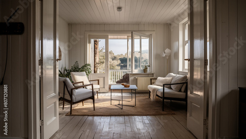 The interior of the room is in the Scandinavian style. A room lit by light from a window.