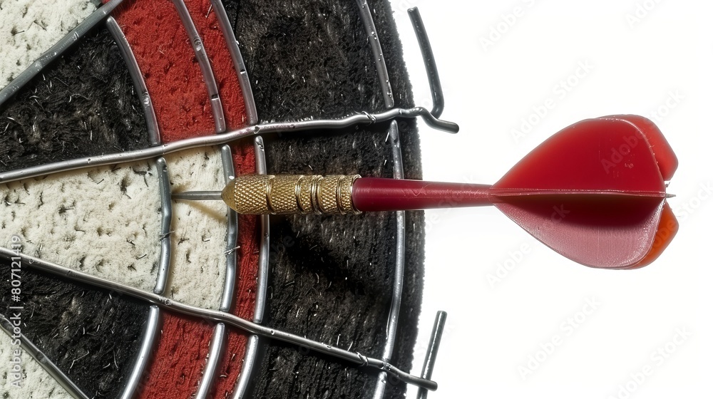 Close view of a dart arrow nailing the bullseye, ideal for illustrating goal achievement and accuracy, isolated setting Close view of a dart arrow nailing the bullseye, ideal for illustrating goal achievement and accuracy, isolated setting