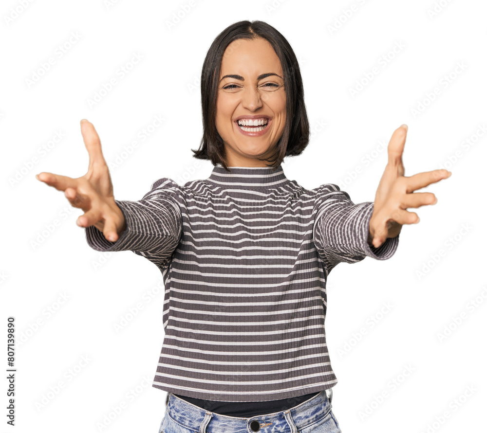 Young Caucasian woman with short hair feels confident giving a hug to the camera. Young Caucasian woman with short hair feels confident giving a hug to the camera.