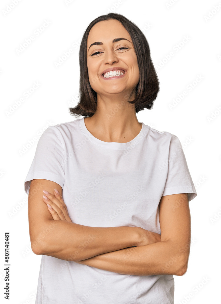 Young Caucasian woman with short hair who feels confident, crossing arms with determination. Young Caucasian woman with short hair who feels confident, crossing arms with determination.