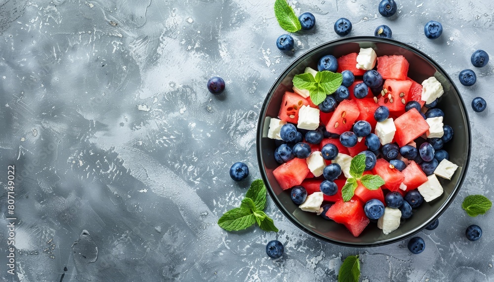 Patriotic salad with blueberries feta watermelon on gray background USA Independence Day Top view Patriotic salad with blueberries feta watermelon on gray background USA Independence Day Top view