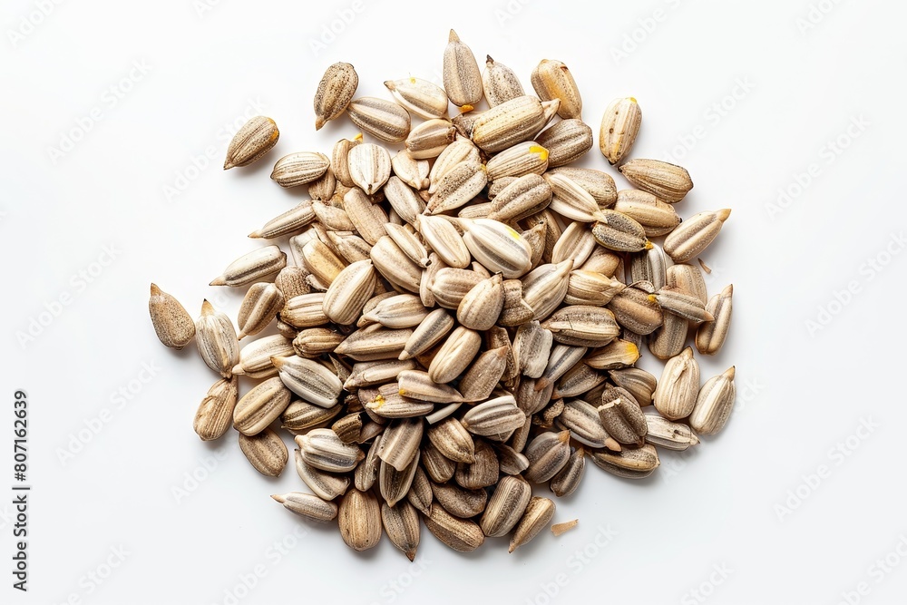 Sunflower seeds on white background from above Sunflower seeds on white background from above