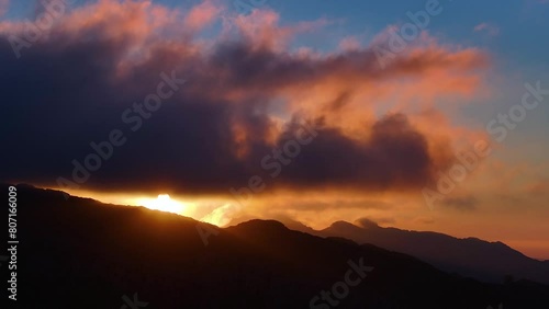 Sunset clouds in Los Machucos at 921 meters above sea level and communicates the villages of Bustablado and San Roque de Riomiera. Pasiegos Valleys, Cantabria, Spain, Europe photo