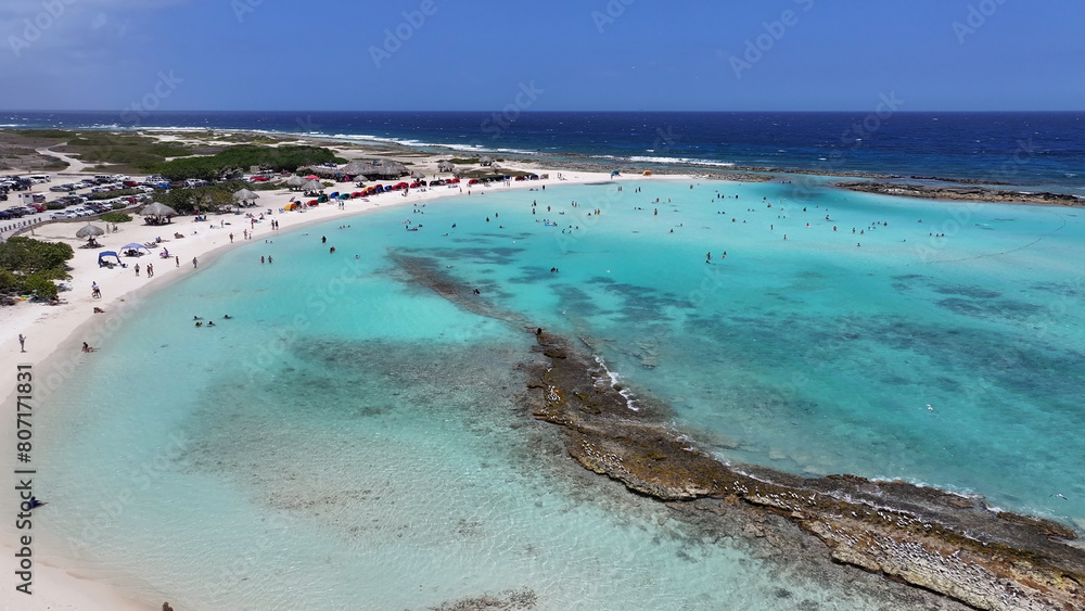 Obraz premium Baby Beach At San Nicolas In Oranjestad Aruba. Beach Landscape. Caribbean Paradise. San Nicolas At Oranjestad Aruba. Seascape Outdoor. Nature Tourism.