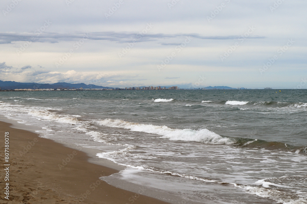 Mediterranean Sea. Beautiful clean sand and sea foam.