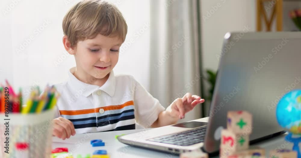 Young Boy Learning Online with Number Toy Young Boy Learning Online with Number Toy