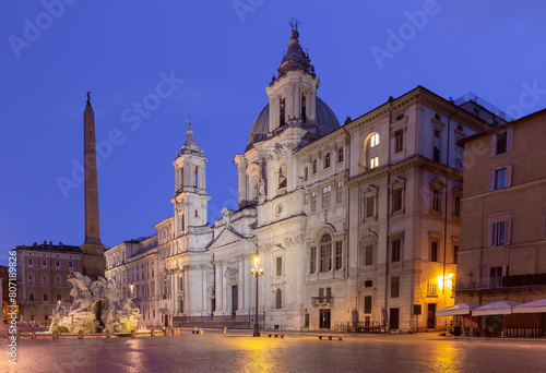 The famous fountains with tritons in Piazza Navona in Rome at dawn. © pillerss