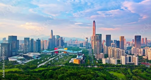 Commercial buildings and natural scenery on sunny day in Shenzhen city photo