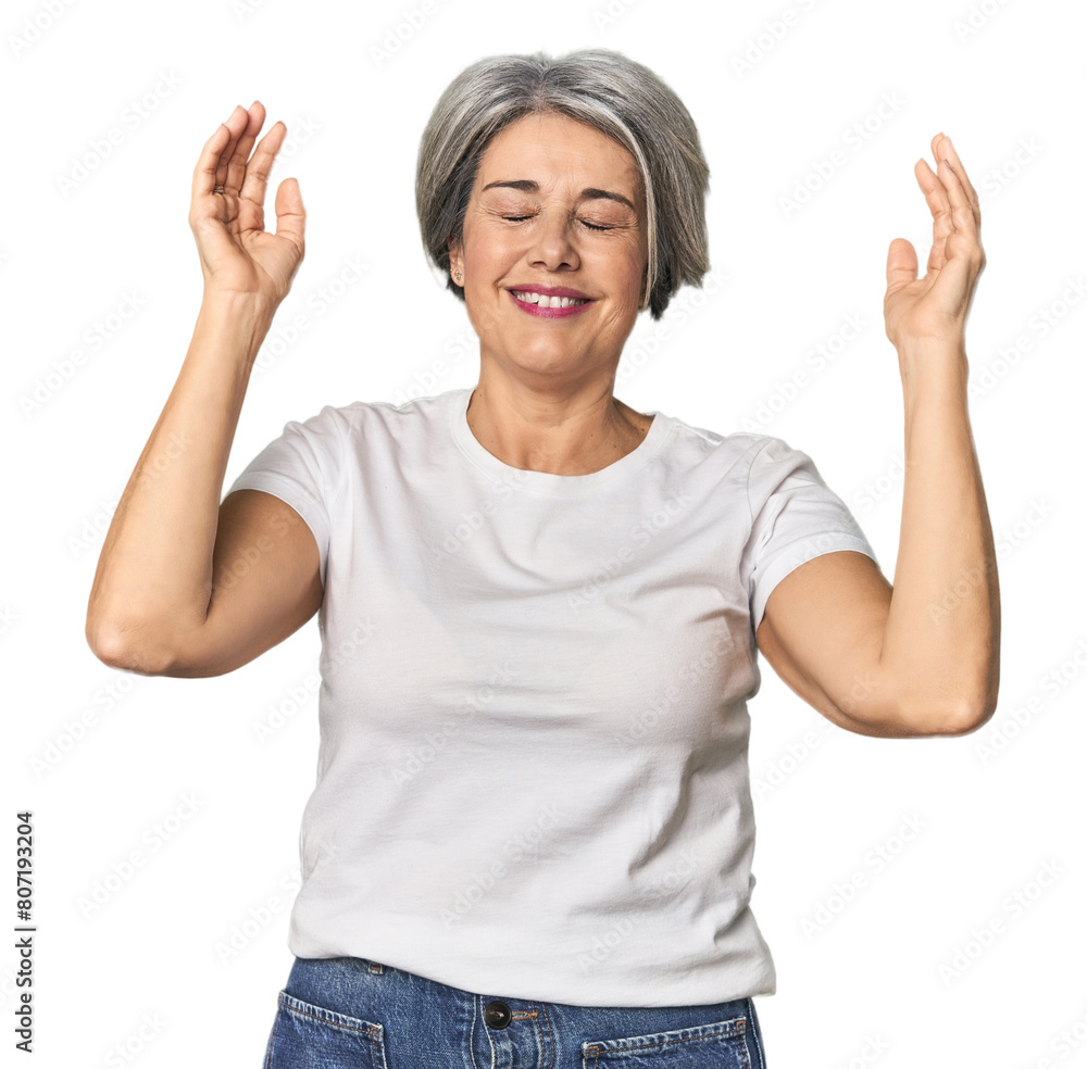 Caucasian mid-age female on studio background joyful laughing a lot. Happiness concept. Caucasian mid-age female on studio background joyful laughing a lot. Happiness concept.