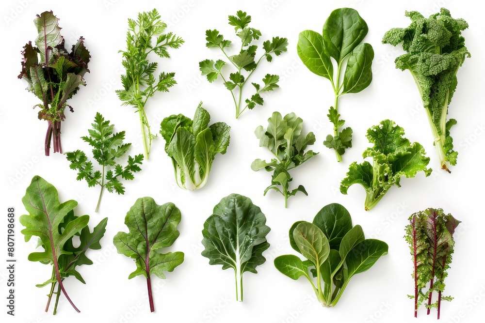 Assortment of green veggies on white backdrop Assortment of green veggies on white backdrop