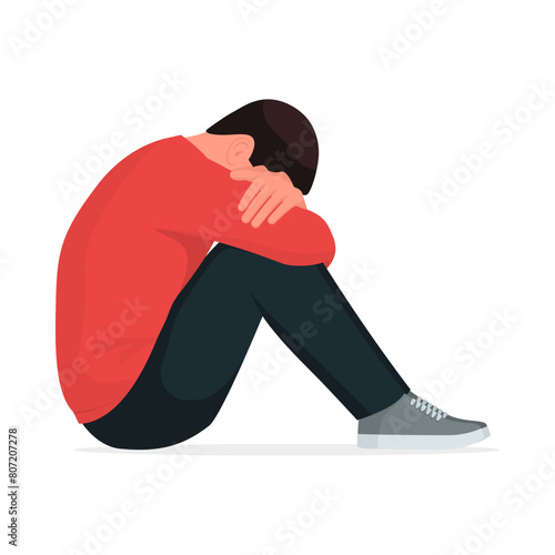 Depressed lonely man sitting and crying