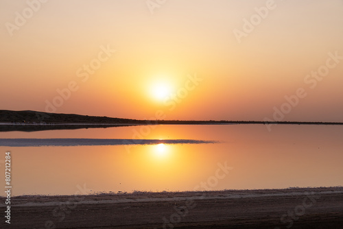 Sunset on a salt lake. Neftchala. Azerbaijan. photo