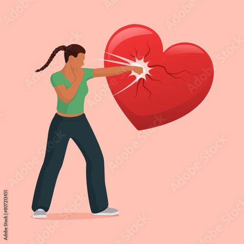 Angry woman punching a heart