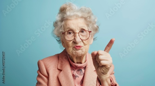 Old woman influencer culture concept, waving finger in disapproval, old woman wearing glasses and pink blazer conveys sense of sternness and discipline, human lady life old order
