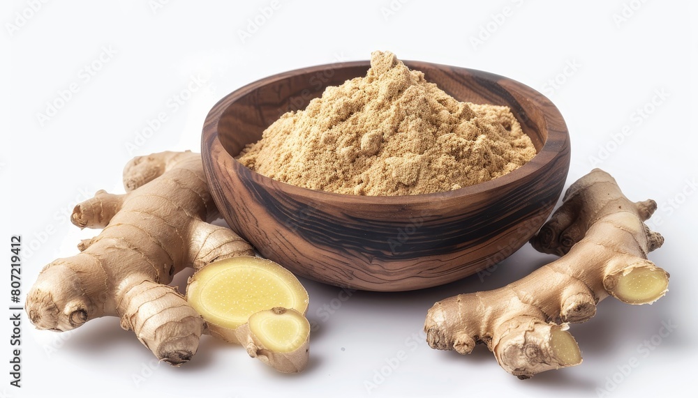 Fototapeta premium Ground dry ginger in wooden bowl on white background