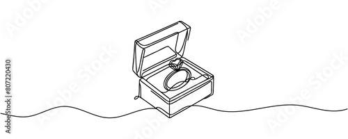 Wedding ring in a box, continuous line drawing. One line art, wedding rings.