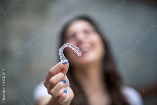 Beautiful Smiling Turkish Woman with invisible teeth bracket aligner