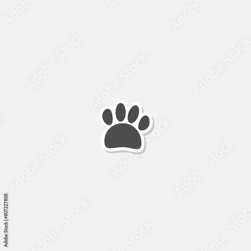Paw print icon sticker isolated on gray background