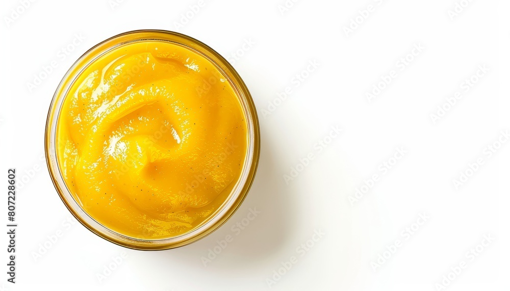 Mustard sauce on white background from above Mustard sauce on white background from above
