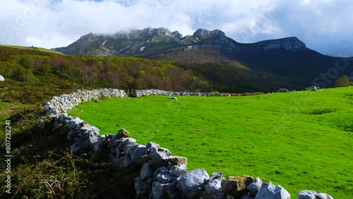 Spring landscape of meadows, forests and rocks in the Ason Natural Park. Soba Valley, Cantabria, Spain, Europe photo