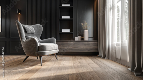 A luxurious, open-plan living room with a black wall providing a striking contrast to the light wood flooring. A sophisticated, wingback chair in charcoal gray offers a cozy reading nook, 